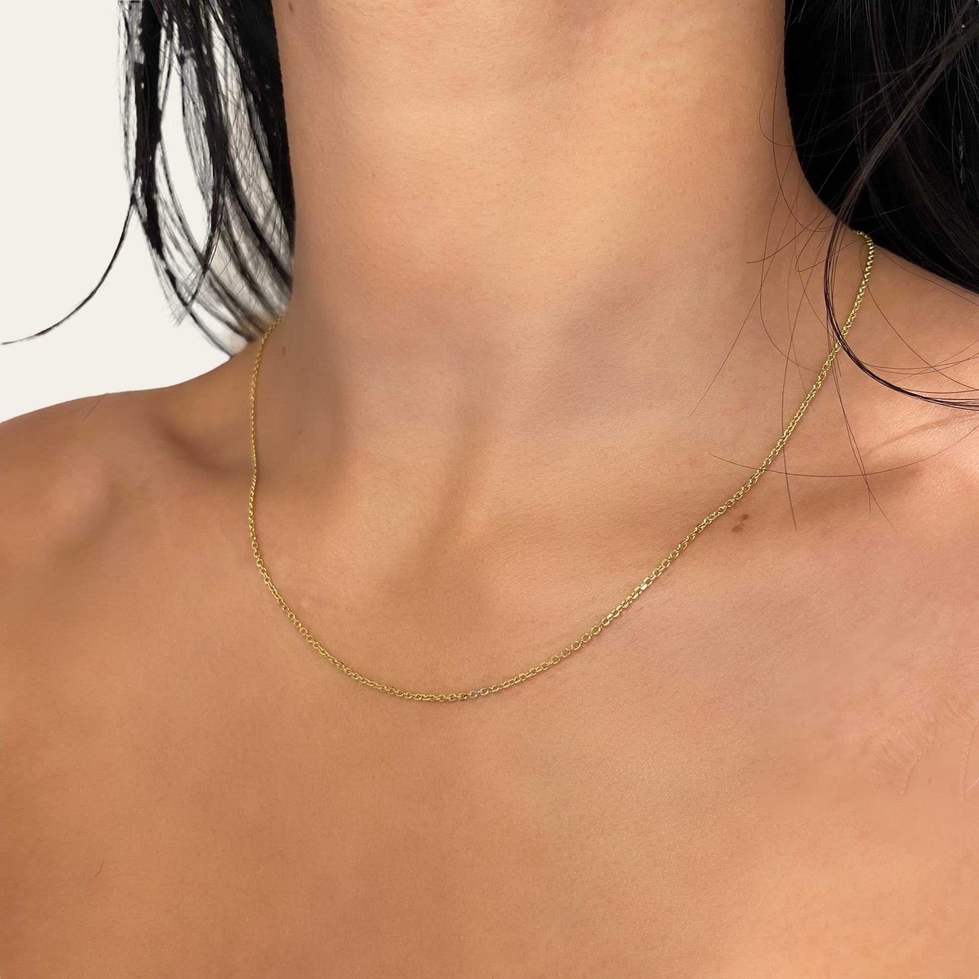 14k gold cable chain necklace on neck